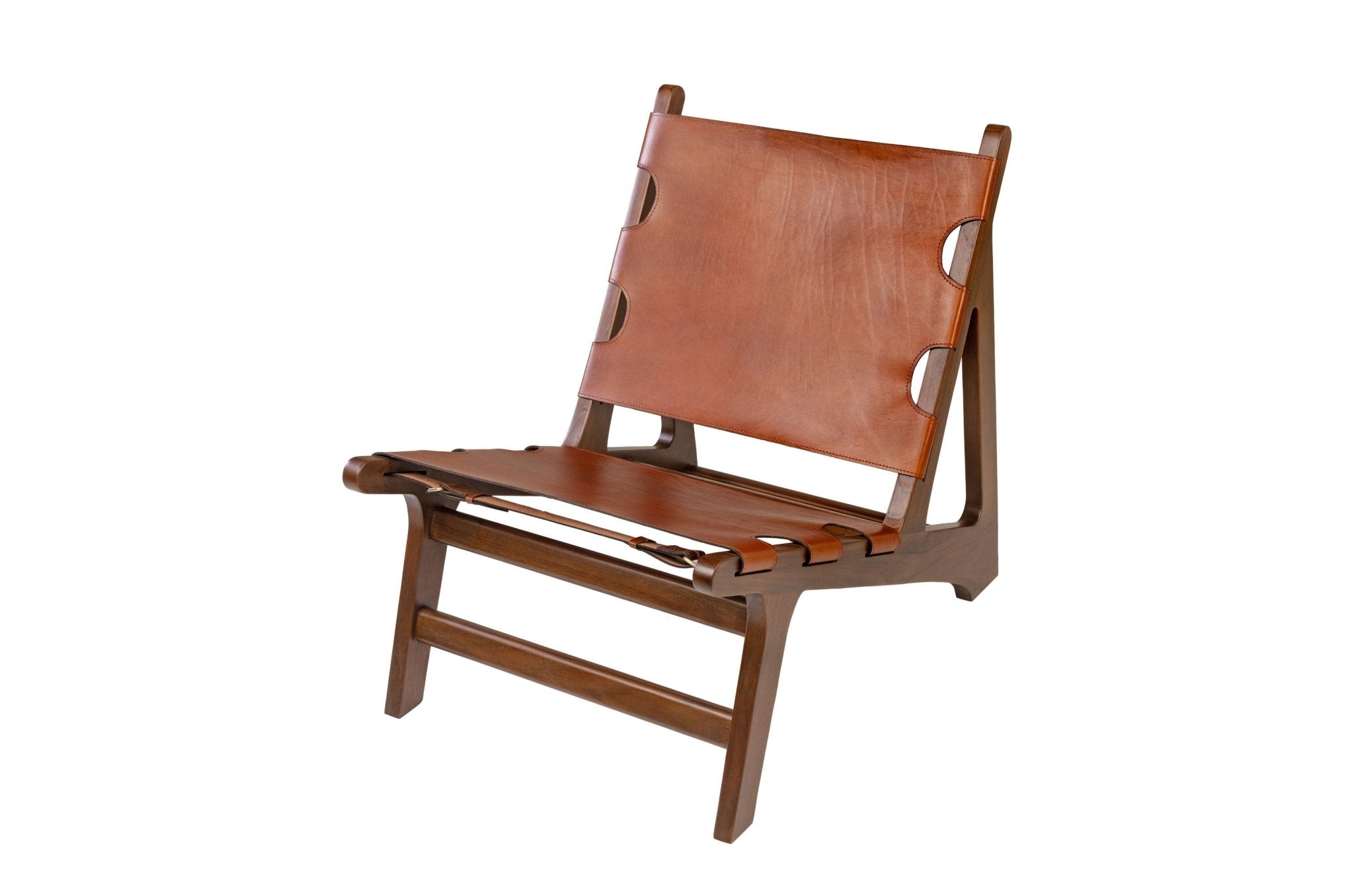 Fauteuil Nomad en teck massif et cuir pleine fleur aniline, design intemporel disponible chez Maison Caldeira.